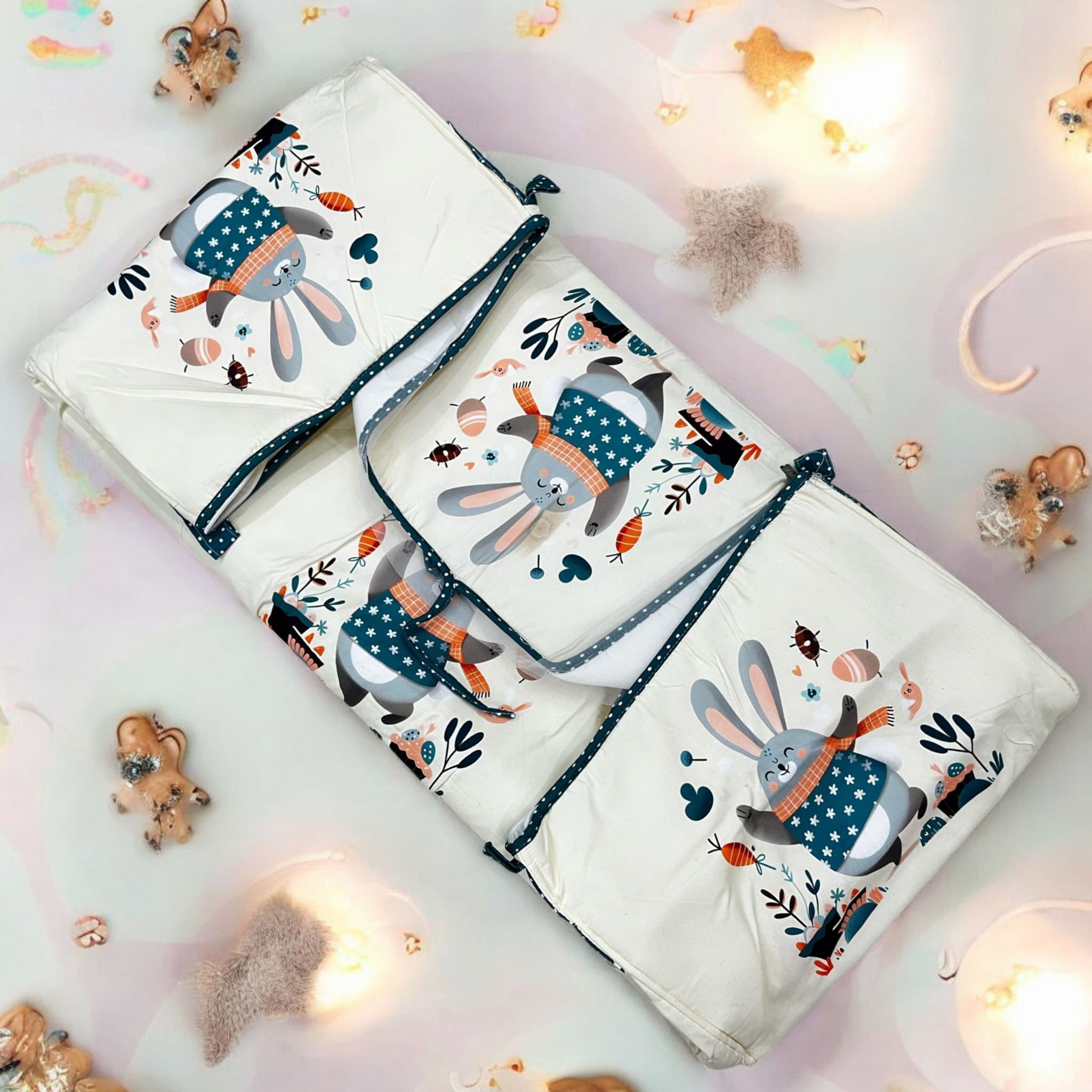 Cute elephant print 7-piece newborn baby bedding combo set for a cozy and playful nursery. Essential baby sleep set for infants and toddlers. www.usmile.com